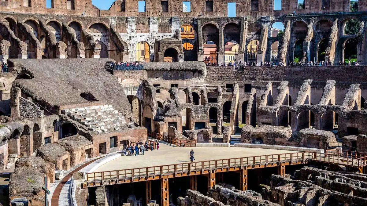 Colosseum interior showing the exposed hypogeum below the partial arena floor on a Colosseum underground tour
